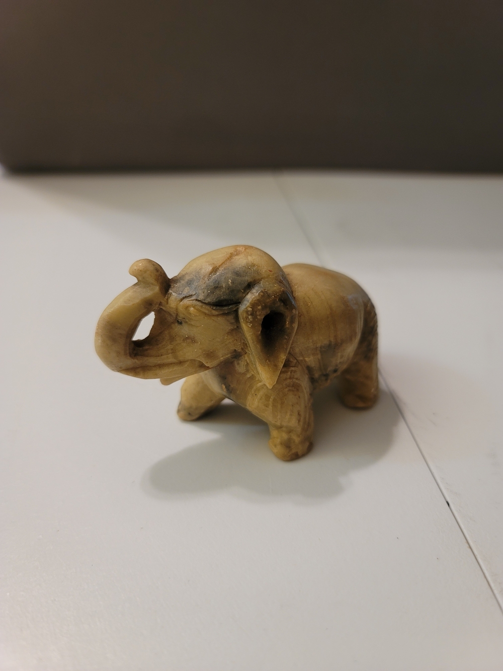 Carved Beige Elephant Sculpture - Decorative Home Accent